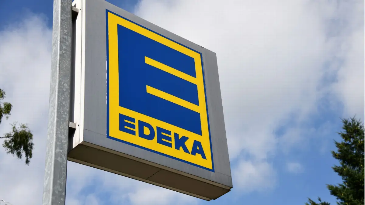 Ehlershausen, Lower Saxony, Germany - August 15, 2021: Logo in front of an EDEKA store in Ehlershausen, Germany - The EDEKA Group is the largest German supermarket corporation