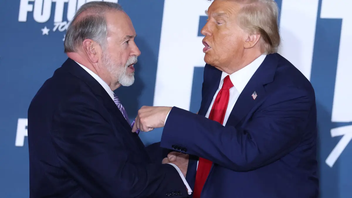 (FILES) Former US President and Republican presidential candidate Donald Trump and Mike Huckabee shake hands after taking part in a roundtable discussion hosted by Building America?s Future in Drexel Hill, Pennsylvania, on October 29, 2024. US President-elect Donald Trump announced on November 12, 2024, his intention to nominate former governor of Arkansas Mike Huckabee as the US ambassador to Israel. (Photo by Charly TRIBALLEAU / AFP)