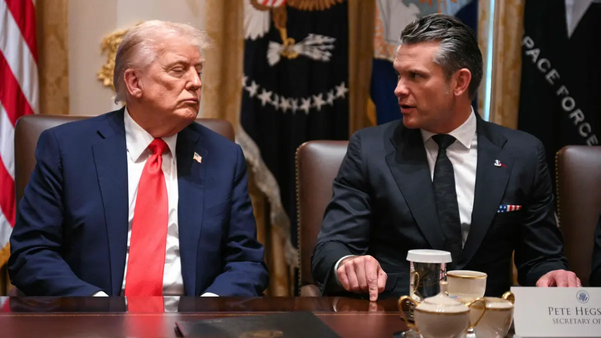 (L/R) US President Donald Trump looks on as Secretary of Defense Pete Hegseth speaks during a cabinet meeting in the Cabinet Room of the White House in Washington, DC, on October 9, 2025. Trump said Thursday he would try to go to Egypt for the signing of a Gaza ceasefire and hostage release deal between Israel and Hamas. (Photo by Jim WATSON / AFP)