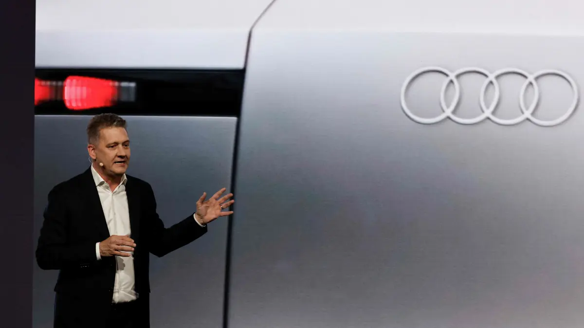 Gernot Doellner, CEO of German carmaker Audi, speaks during the presentation of their car the Audi F1 factory team set to compete in the Formula One starting in the 2026 season in Munich, southern Germany on November 12, 2025. (Photo by Alexandra BEIER / AFP)