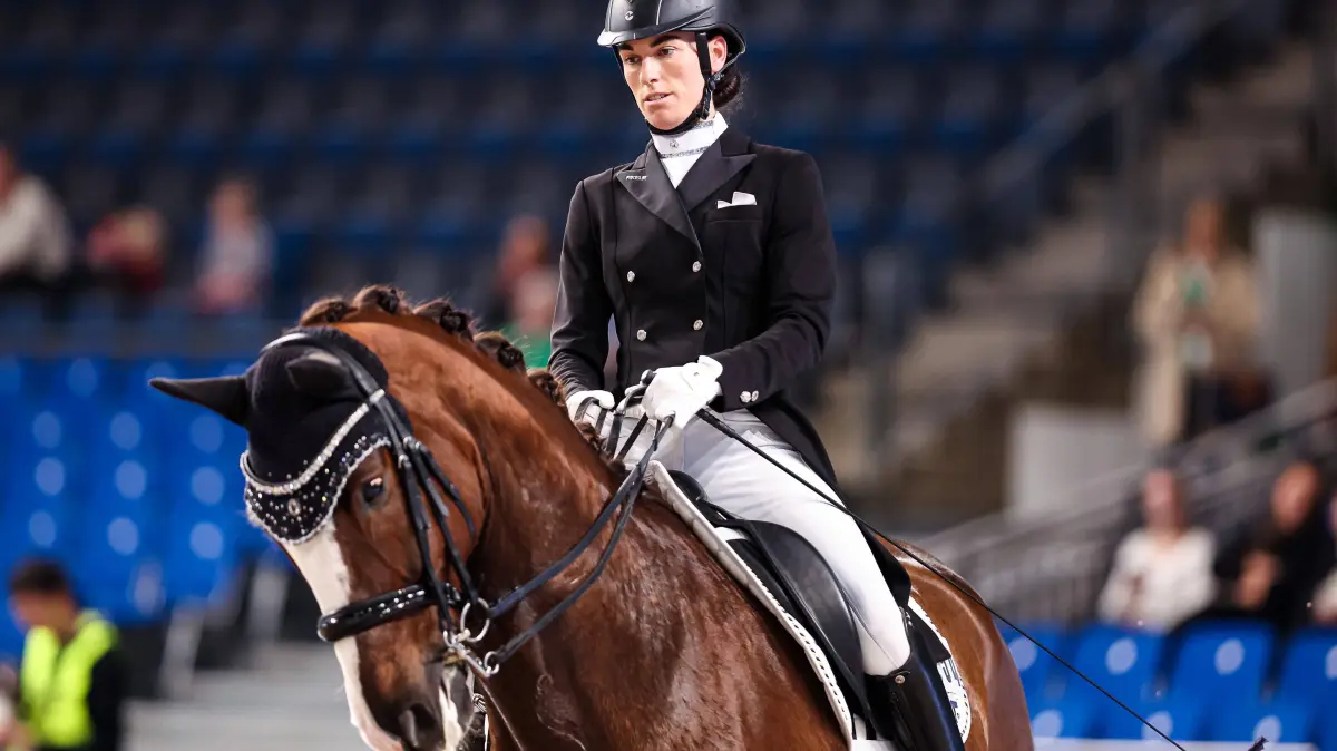 GER, Stuttgart German Masters 2025, 39. internationales Reitturnier, 12.11.2025: GER, Linda Jung auf Qu est-ce que c est RC Renningen Preis der Firma iWEST Dressurpruefung Kl. S Intermediaire I, Baden-Wuerttemberg GER, Stuttgart German Masters 2025, 39. internationales Reitturnier, 12.11.2025 GER, Stuttgart German Masters 2025, 39. internationales Reitturnier, 12.11.2025 Stuttgart *** GER, Linda Jung on Qu est ce que c est RC Renningen Preis der Firma iWEST Dressurpruefung Kl S Intermediaire I, Baden Wuerttemberg GER, Stuttgart German Masters 2025, 39 international horse show, 12 11 2025 GER, Stuttgart German Masters 2025, 39 international horse show, 12 11 2025 Stuttgart Copyright: xEibner-Pressefoto/RogerxBuerkex EP_RBE