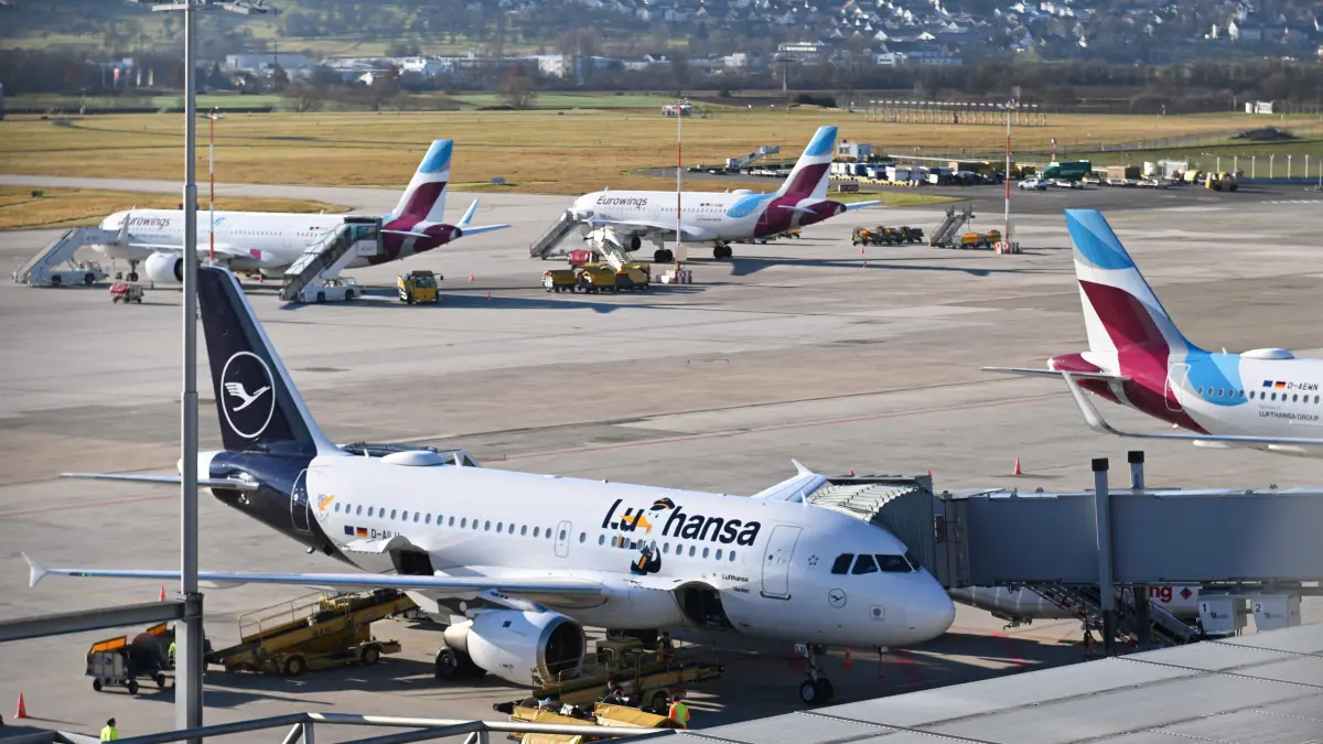 A Boeing 737-200 passenger plane of German airline Lufthansa stands on the tarmac of Stuttgart Airport (STR) in Stuttgart, southwestern Germany, on December 15, 2025. (Photo by THOMAS KIENZLE / AFP)