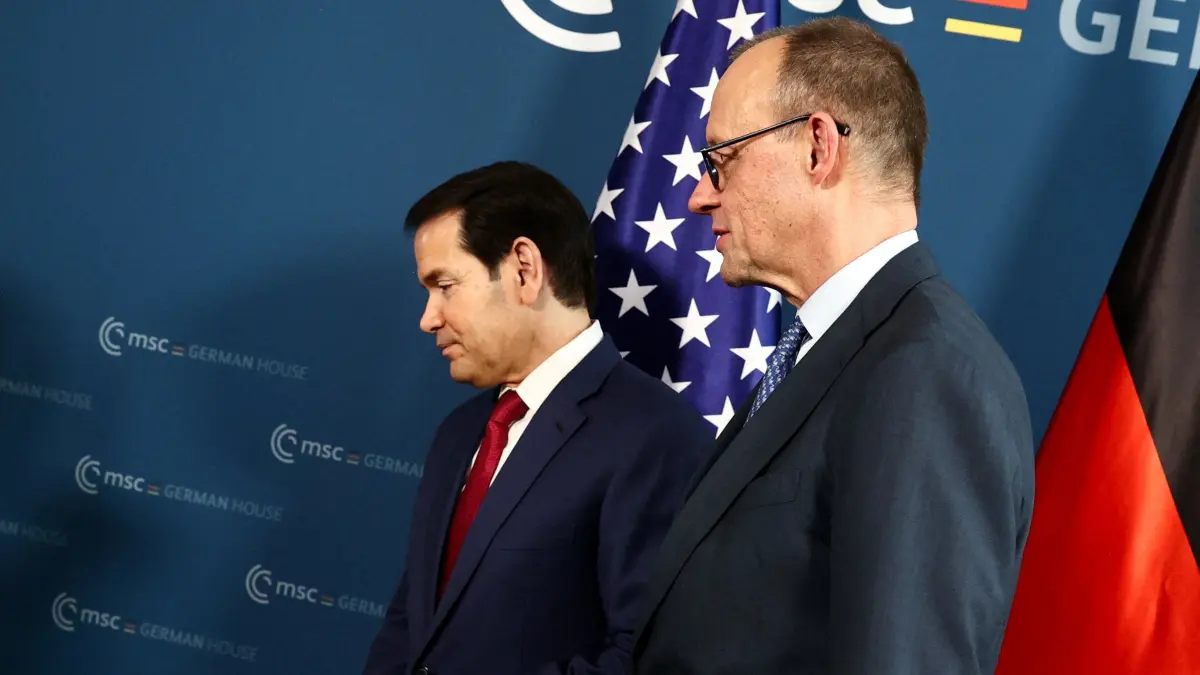 German Chancellor Friedrich Merz (R) and US Secretary of State Marco Rubio attend a bilateral meeting on the sidelines of the Munich Security Conference (MSC) in Munich, Germany, February 13, 2026. (Photo by Liesa Johannssen / POOL / AFP)