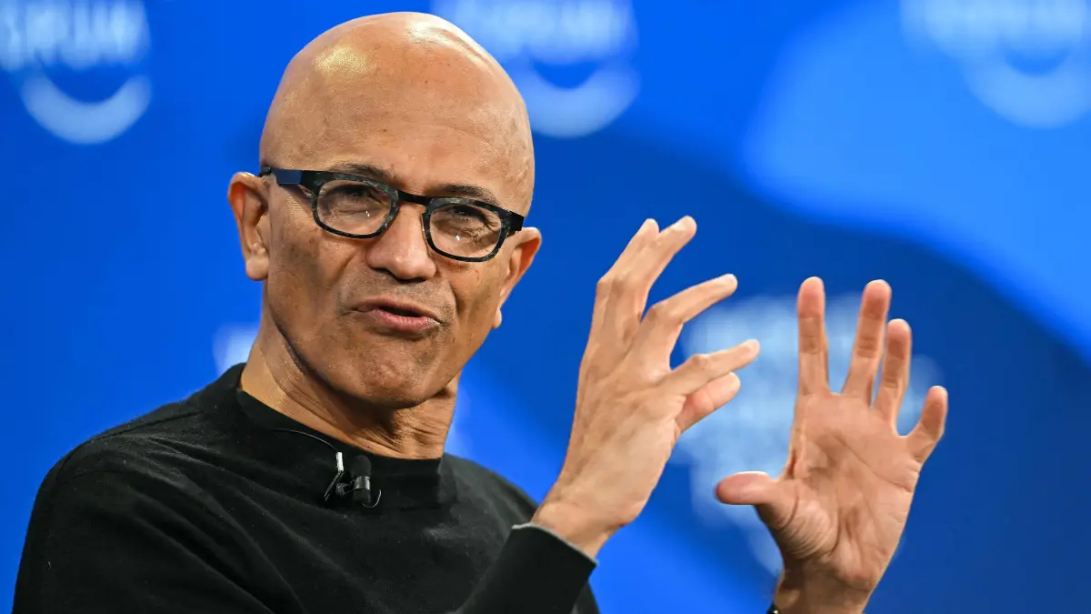 (FILES) Microsoft CEO Satya Nadella gestures as he speaks during the World Economic Forum (WEF) annual meeting in Davos on January 20, 2026. Microsoft CEO Satya Nadella is expected to take the stand Monday in Elon Musk's lawsuit against OpenAI, to explain emails that revealed how his company funded the ChatGPT creator's shift from philanthropic organization to for-profit AI giant (Photo by Fabrice COFFRINI / AFP)