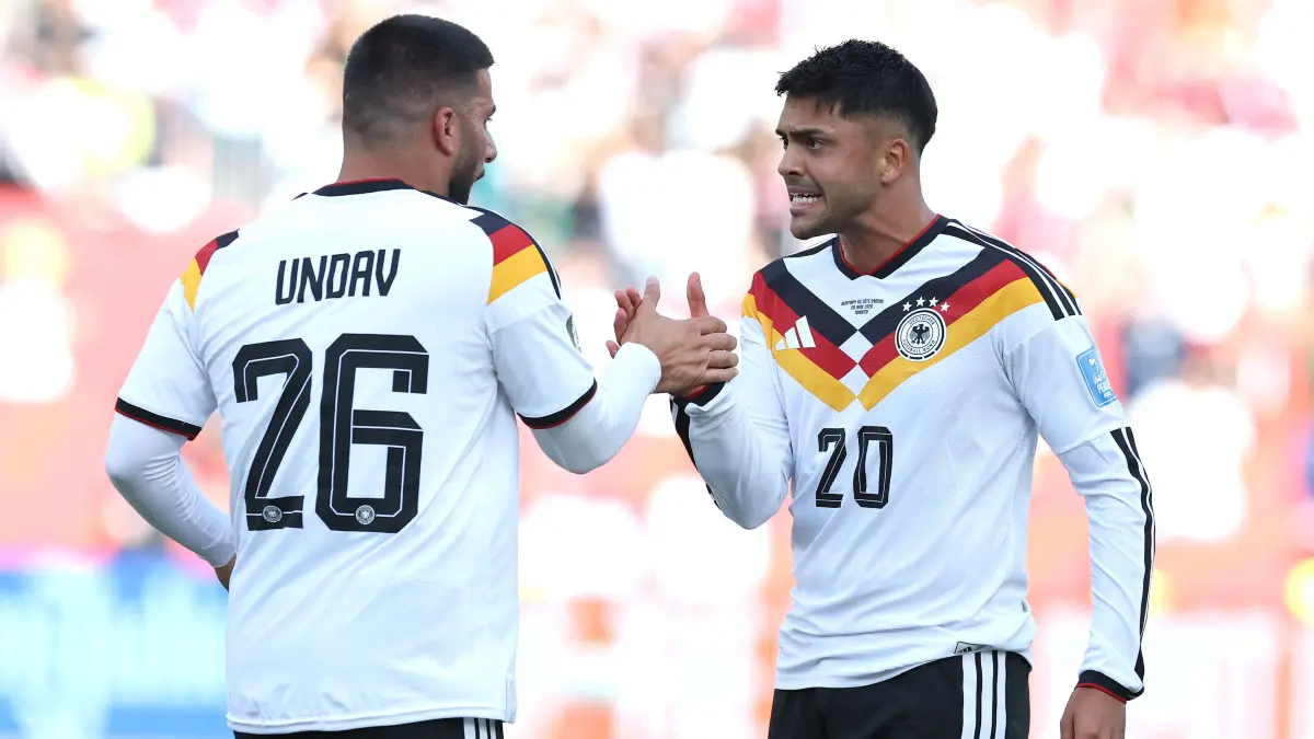 Germany v Cote D'Ivoire: Group E - FIFA World Cup 2026: TORONTO, ONTARIO - JUNE 20: Deniz Undav #26 of Germany celebrates with teammate Nadiem Amiri #20 after scoring his team's first goal during the FIFA World Cup 2026 Group E match between Germany and Cote D'Ivoire at Toronto Stadium on June 20, 2026 in Toronto, Ontario. Alexander Hassenstein/Getty Images/AFP (Photo by ALEXANDER HASSENSTEIN / GETTY IMAGES NORTH AMERICA / Getty Images via AFP)