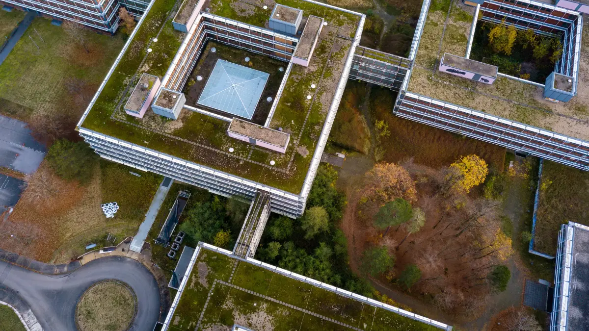 Aerial detail view of the famous Eiermann Campus in Stuttgart that was planned by famous Bauhaus architect Egon Eiermann from 1965 on and was used as an office space until 2009. Since then it is remaining unused, announced as cultural landmark and now being planned to be converted into a residential area.