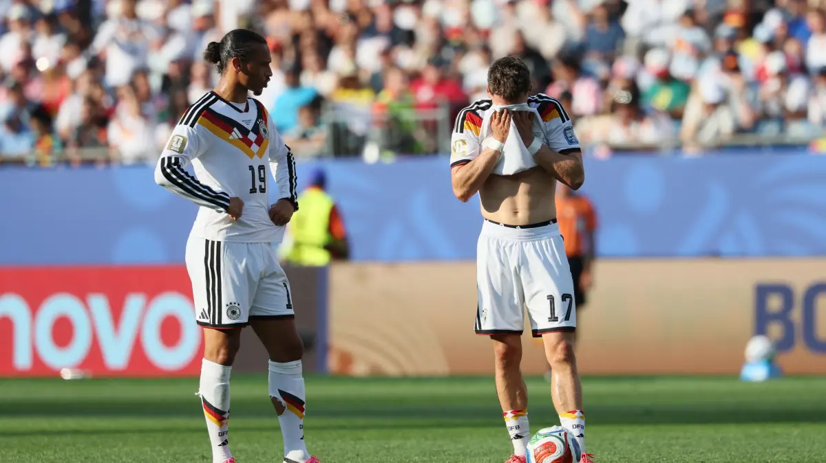 FBL-WC-2026-MATCH74-GER-PAR: Germany's midfielder #17 Florian Wirtz (R) gestures past forward #19 Leroy Sane during the 2026 World Cup round of 32 football match between Germany and Paraguay at the Boston Stadium in Foxborough on June 29, 2026. (Photo by Odd ANDERSEN / AFP)