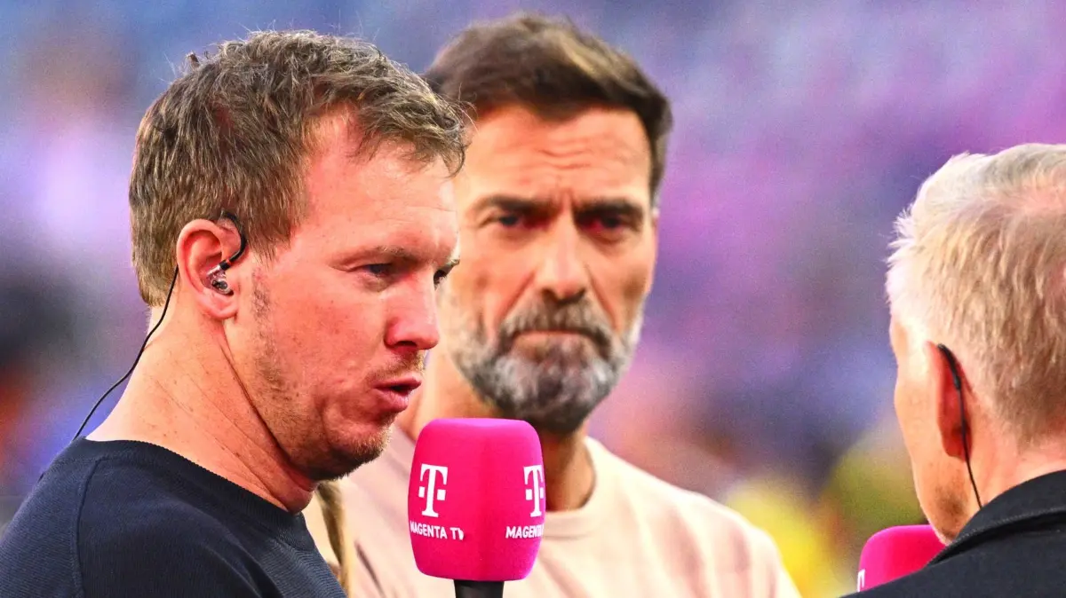 WM 2026 - Deutschland - Paraguay: 30.06.2026, USA, Foxborough: Fußball, Männer, WM 2026, Nationalmannschaft, Deutschland - Paraguay, Sechzehntelfinale im Boston -Stadion, Bundestrainer Julian Nagelsmann (l) im Interview mit Jürgen Klopp (M), TV-Experte, und Moderator Johannes B. Kerner.
ACHTUNG: Gemäß den Auflagen der FIFA dürfen die Bilder ausschließlich zur redaktionellen Verwendung genutzt werden. Eine kommerzielle Nutzung ist ausgeschlossen. Zudem dürfen keine videoähnlichen Sequenzen erstellt werden, und es dürfen keine Veränderungen weder im Vordergrund noch im Hintergrund am Bild vorgenommen werden. Foto: Tom Weller/dpa +++ dpa-Bildfunk +++