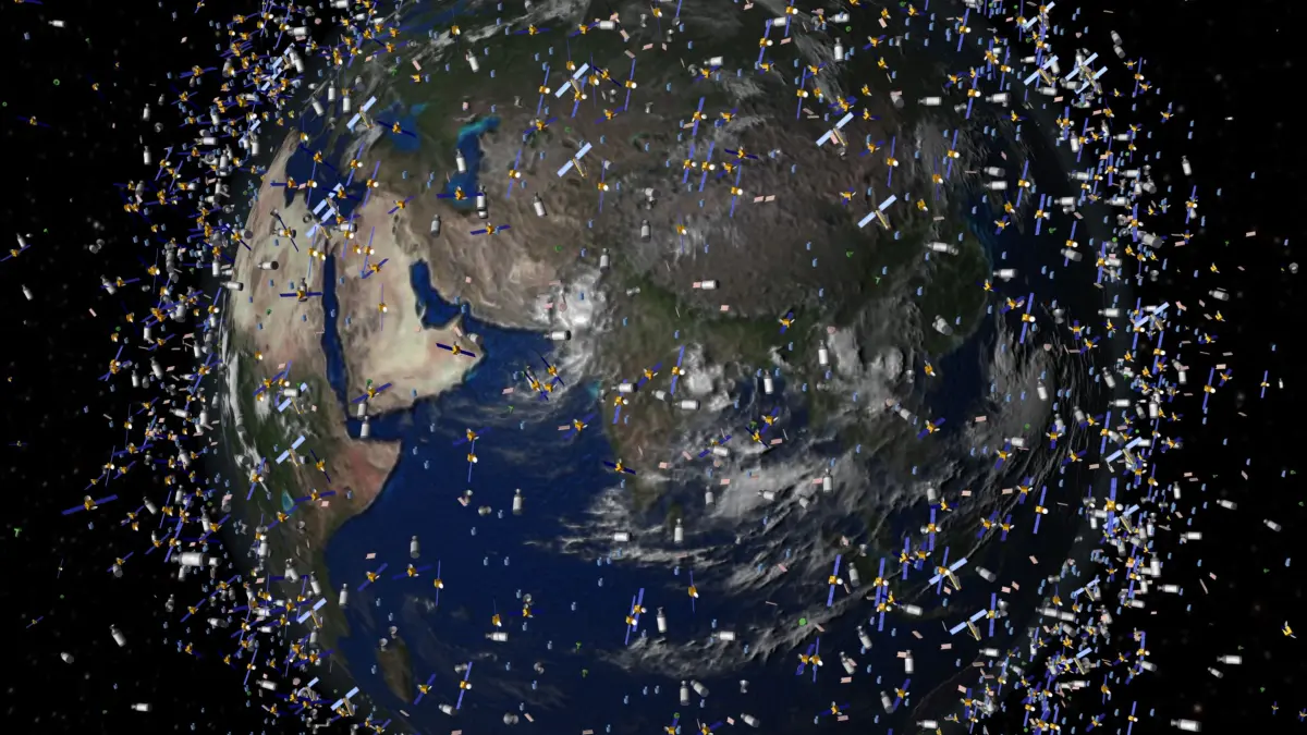 Das computergenerierte Bild der European Space Agency (ESA) zeigt Weltraummüll früherer Weltraummissionen, der neben intakten Satelliten um die Erde kreist.