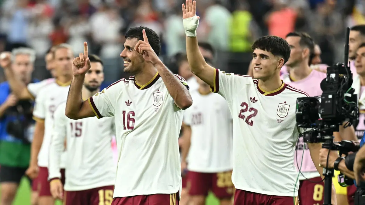 FBL-WC-2026-MATCH101-FRA-ESP: Spain's midfielder #16 Rodri and defender #22 Pau Cubarsi celebrate after their team won the 2026 World Cup football tournament semi-final match between France and Spain at the Dallas Stadium in Arlington on July 14, 2026. (Photo by Paul ELLIS / AFP)