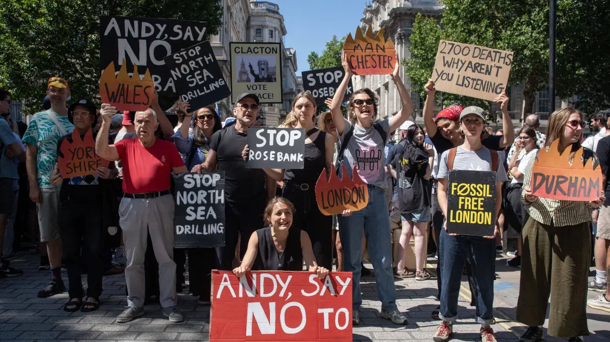Fossil Free London Demo In London, UK: July 20, 2026, London, England, United Kingdom: Supporters of the Fossil Free London staged a demonstration outside Downing Street to demand from the new Prime Minister of the United Kingdom, Andy Burnham to say no for the Rosebank oilfield drilling on the North Sea. .The Rosebank oil field is the UKÃââ s largest untapped oil reserve, located roughly 130 km west of Shetland. Operated by Adura a joint venture between Equinor and Shell and co-owned by Ithaca Energy. London United Kingdom - ZUMAe120 20260720_zip_e120_016 Copyright: xKrisztianxElekx