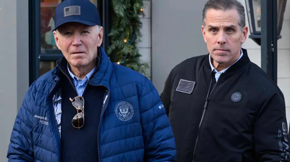 Former US president Biden's cancer has spread: son: (FILES) US President Joe Biden (L) and son Hunter Biden step out of a bookstore while shopping in Nantucket, Massachusetts on November 29, 2024. Former president Biden's cancer has metastasized further, according to his son Hunter Biden, who shared the update in an interview with the BBC broadcasted on August 7, 2026. In May 2025, just four months after he left office as the oldest sitting president, the elder Biden revealed he had been diagnosed with an aggressive form of prostate cancer that had spread to his bones. (Photo by Mandel NGAN / AFP)
