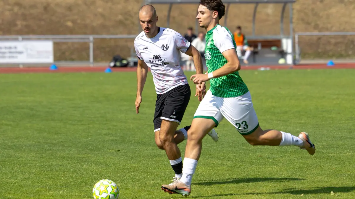 GSV Maichingen - 1. FC Normannia Gmuend, Fussball, Herren, WFV-Pokal, Saison 2026/2027, 01.08.2026, Nils Staiger (1. FC Normannia Gmuend #03) und Anton Lendl (GSV Maichingen #23)
Foto: DROFITSCH/EIBNER