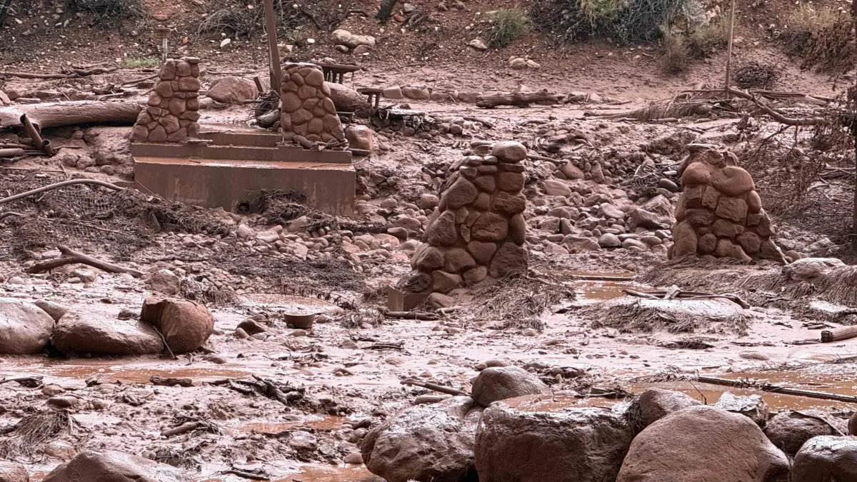 US-ENVIRONMENT-FLOODS-GRAND CANYON: This handout image released by the Grand Canyon National Park Service via X (formerly Twitter) on August 30, 2026 shows remnants of stone bridge pylons along Bright Angel Creek following a flash flood that destroyed the footbridge on August 29. More than 20 people may be missing after the flash flood in Grand Canyon National Park according to the National Park Service. The floods hit the Bright Angel Canyon and Phantom Ranch area on Saturday, the service said, adding that it was working with Arizona authorities to evacuate people and account for individuals in the affected area. (Photo by J.THOMPSON and Handout / NATIONAL PARK SERVICE / AFP) / RESTRICTED TO EDITORIAL USE - MANDATORY CREDIT "AFP PHOTO / NATIONAL PARK SERVICE " - NO MARKETING - NO ADVERTISING CAMPAIGNS - DISTRIBUTED AS A SERVICE TO CLIENTS