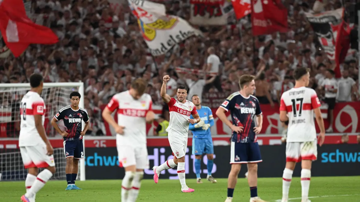FBL-GER-BUNDESLIGA-STUTTGART-COLOGNE: Stuttgart's Bosnian forward #09 Ermedin Demirovic (C) celebrates scoring the 3-0 goal with his teammates during the German first division Bundesliga football match between VfB Stuttgart and FC Cologne in Stuttgart, south-western Germany on September 4, 2026. (Photo by THOMAS KIENZLE / AFP) / DFL REGULATIONS PROHIBIT ANY USE OF PHOTOGRAPHS AS IMAGE SEQUENCES AND/OR QUASI-VIDEO