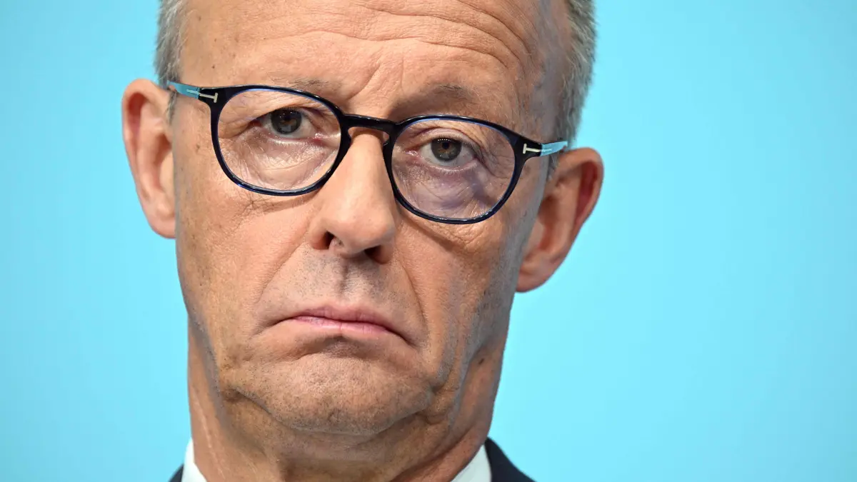 GERMANY-POLITICS-VOTE-STATE-SAXONY-ANHALT-CDU: German Chancellor and leader of Germany's Christian Democratic Union (CDU) Friedrich Merz reacts during a press conference after the party's leadership meeting in Berlin on September 7, 2026, one day after regional elections in the eastern federal state of Saxony-Anhalt. (Photo by RALF HIRSCHBERGER / AFP)