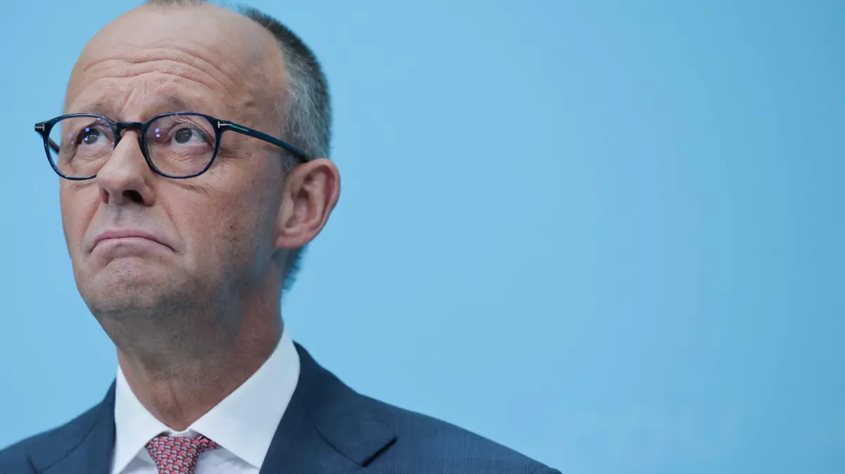 GERMANY-POLITICS-VOTE-STATE-BERLIN-MECKLENBURG-WESTERN POMERANIA: German Chancellor and leader of Germany's Christian Democratic Union (CDU) Friedrich Merz, addresses a press conference one day after state elections in Berlin and Mecklenburg-Western Pomerania in Berlin on September 21, 2026. (Photo by Jens SCHLUETER / AFP)