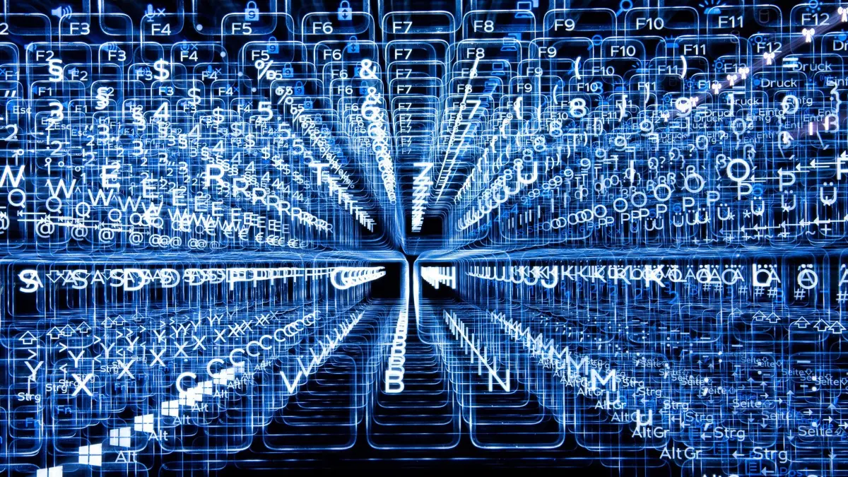 Illustration KI: Tasten einer beleuchteten Tastatur (Aufnahme mit Zoomeffekt). Künstliche Intelligenz kommt immer häufiger in den Personalabteilungen in Deutschland zum Einsatz. (zu dpa: «Großer Empfang, lange Konfliktliste: Xi besucht Trump»)