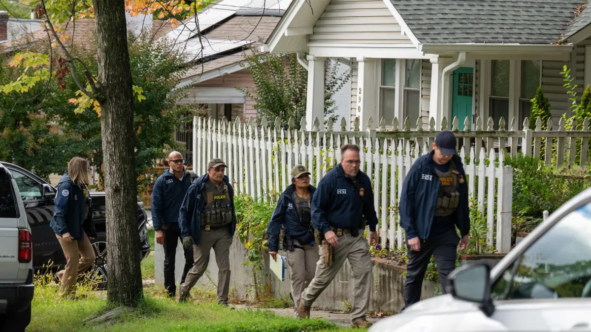Democratic Rep. Ilhan Omar's D.C. Home Searched By Federal Agents Early Monday Morning: WASHINGTON, DC - OCTOBER 12: Homeland Security Investigations police search the home of Rep. Ilhan Omar (D-MN) on October 12, 2026 in Washington, DC. According to reports, the search is part of an ongoing criminal investigation. Andrew Leyden/Getty Images/AFP (Photo by Andrew Leyden / GETTY IMAGES NORTH AMERICA / Getty Images via AFP)