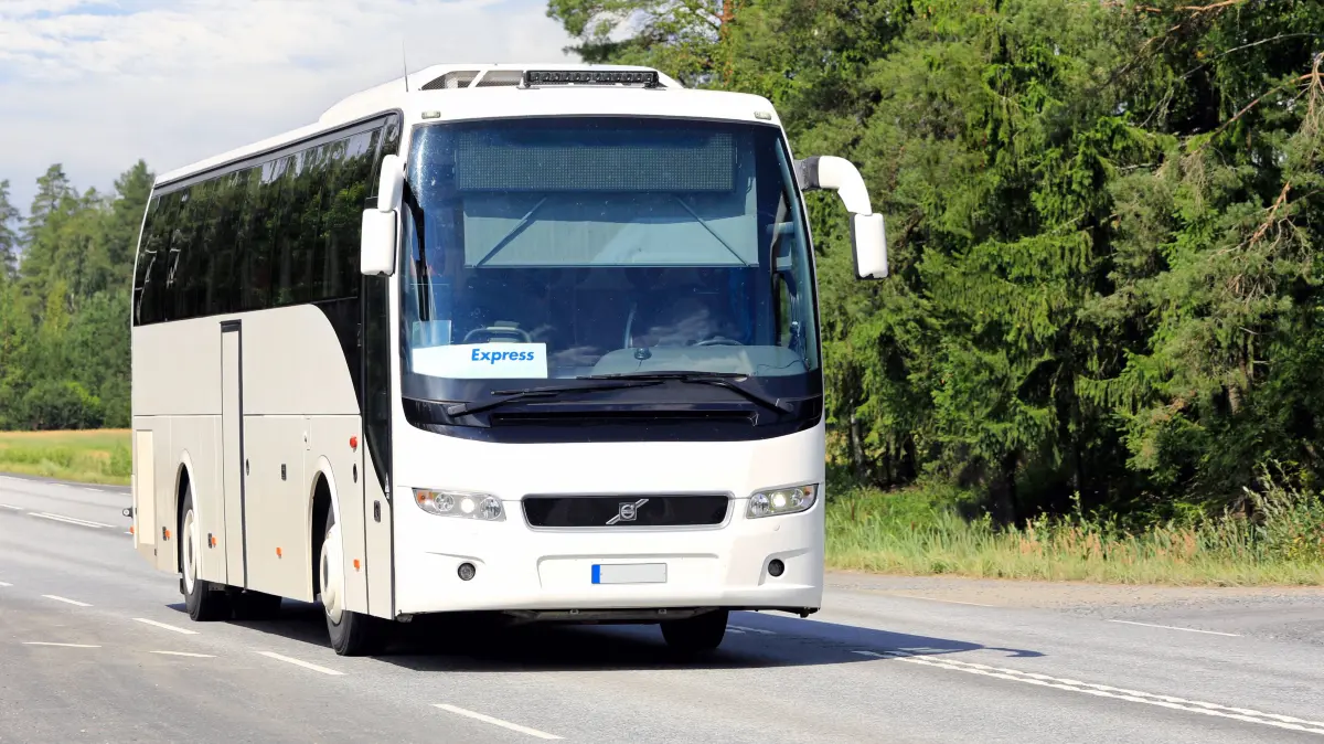 White Volvo 9700H NG Coach Bus on the Road White Volvo 9700H NG coach bus for express long distance travel at speed on highway on a beautiful day of summer. Jokioinen, Finland. August 8, 2024. Copyright: xZoonar.com/TAINAxSOHLMANx 22266874